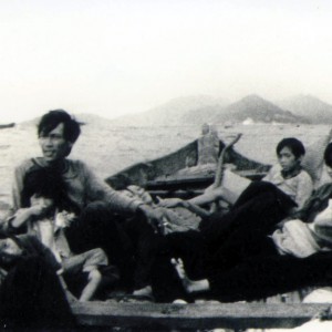 Quynh Nguyen Forss (Jour’95) leans against her dad with her sister at left and her mom and newborn sister directly across from them as they fled Vietnam in 1979.