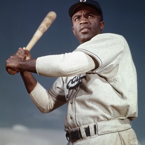 Jackie Robinson’s 1947 debut with the Brooklyn Dodgers as Major League Baseball’s first black player prompts examination of racial attitudes in the U.S.